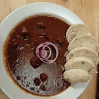 Dark beer goulash with bread dimplings at Střecha in Prague