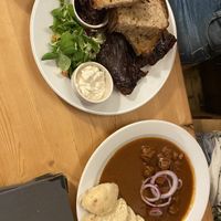The goulash and the “ribs” (the bread and the pickled onions were nice too!)  at Střecha in Prague