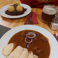 Goulash and dumpling on red cabbage at Střecha in Prague