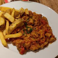 Spicy vegan meat with vegetables at Střecha in Prague
