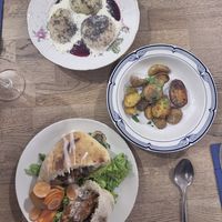 Chicken pita, potatoes, and plum dumplings!  at Střecha in Prague