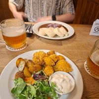 Fried cauliflower and vegan goulash. at Střecha in Prague