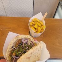 Chips👍👍👍 and pita with slaw, chimmichurri, pickles, chickpeas  at Maoz in Barcelona