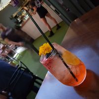 Hideaway Spritz with prosecco, Aperol, topped with soda & fresh seasonal fruit at Hideaway Kitchen & Bar in Broadbeach