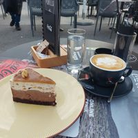 Snickers cake and cappuccino with almond milk at Cajnica Vanilla in Koper