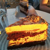 Hazelnut-chocolate-caramel cake (in sunset lighting 😋) at Cajnica Vanilla in Koper