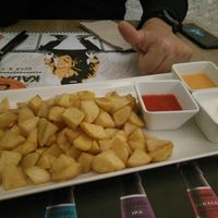 Kadabra potatoes with sauces (two of them are vegan) at Kadabra León in Leon