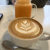 Oat flat white and fruit smoothiee  at Jusu Brothers in West London