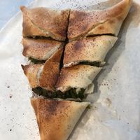 Delicious vegan spinach pie! at Manoush'eh in Vancouver