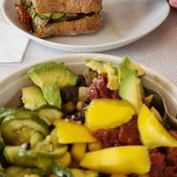 Vegan salad bowl and vegan sandwich at Escosazio in Rome