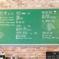 drinks sign at Raw Deal in Menomonie