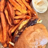 Sweet & Spicy Crispy Tofu Sandwich with sweet potato fries and garlic aioli.   at SEA - Floret in Seattle