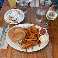 Spicy crispy tofu sandwich with yam fries, wine, cinnamon roll. YUMMMMM  at SEA - Floret in Seattle