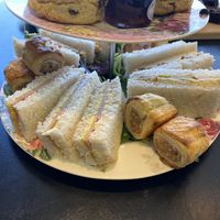 Ham and mustard sandwiches and sausage rolls (afternoon tea)  at Baskerville's Coffee House in Maidstone