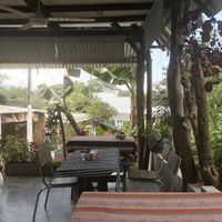 Inside or outside seating area at Duni in Minca