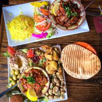 Vegan Mezze platter and sautéed aubergine dish. So delicious!! at Tarboush in Watford