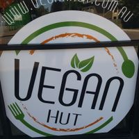 Outdoor signage at Vegan Hut in Maitland