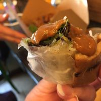 Partially eaten tofu summer roll, with peanut sauce at The Banh Mi Shop in White Plains
