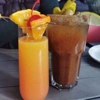 Vegan Caesar & tequila sunrise mimosa. at MeeT in Yaletown in Vancouver