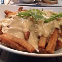 "Teem Poutine" was divine. Huge portions so you could definitely split it  at MeeT in Yaletown in Vancouver