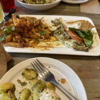 We shared gnocchi with whipped feta(amazing) and a pesto chicken Sammy with upgraded butter chicken poutine fries. Fantastic!  at MeeT in Yaletown in Vancouver