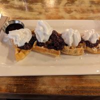 Waffles with compote and coconut cream and maple syrup (unaltered) at MeeT in Yaletown in Vancouver