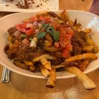 Butter Chikkin Poutine at MeeT in Yaletown in Vancouver