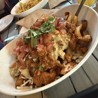 Poutine butter chiken   at MeeT in Yaletown in Vancouver