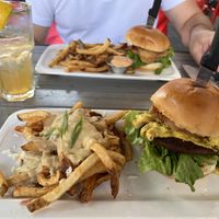 Mighty Mac Burger with poutine and Chikkin Bacun Ranch Burger  at MeeT in Yaletown in Vancouver