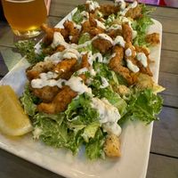 Crispy calamari Caesar salad   at MeeT in Yaletown in Vancouver