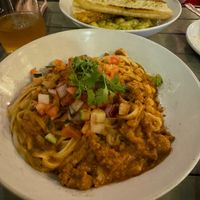Butter chicken noodles dish  at MeeT in Yaletown in Vancouver