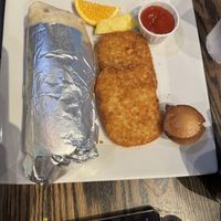 Vegan Breakfast Tofu Western Wrap with hash brown, fruit and vegan muffin   at Hometown Sports Grill in Ottawa