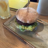 Erbsenkönigin Burger and orange lemon lemonadee  at Hans Im Glück in Berlin