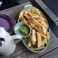 Fries with Avocado dip at Hans im Glück in Dresden