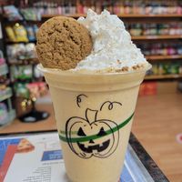 Vegan pumpkin spice milkshake with vegan whip and cookie at The Pop Shop in Frederick
