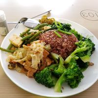 Lots of Vegetable options. This plate has brown rice. You can choose olive rice too. at Yum Yum Yummy Vegetarian - Bukit Merah Central in Central Singapore