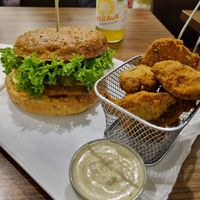 Vegan Cheesburger and "Steirer Nuggets" with mate tea at Die Grüne Karotte in Graz