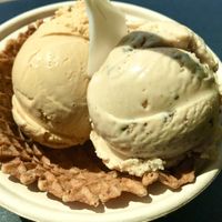 Non dairy Salted Caramel & Peanut Butter Chip with vegan waffle cone. ✨ at Revival Ice Cream in Monterey