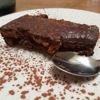 Bizcocho casero relleno de albaricoque y chocolate at Enkuentro Cocina Natural in Castellon De La Plana