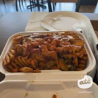 Loaded vegan fries  at The Curry Pizza Company - Shaw Ave in Fresno