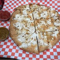 Vegan garlic bread with marinara and curry sauce  at The Curry Pizza Company - Shaw Ave in Fresno