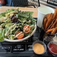 Kale Caesar salad and sweet potato fries  at By Chloe - Tower Bridge in London