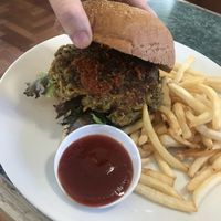 Vegan lentil burger with chips. Tasty but not as good as the tofu burger.  at Badde Manors in Glebe