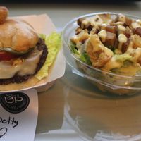 The Dotty (Messy) Burger:
nut patty, "cheese", tomato, lettuce, onion and pickle on 'Breadworks' ciabatta bun.
Caesar Salad:
Romaine lettuce, house-made facon bits, croutons with the worlds best home-made caesar dressing! at Stir It Up in Charlottetown