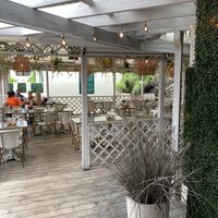 2 outdoor seating terraces at Village Pantry in Hamilton