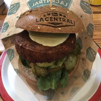 Vegan patty, cashew cashew cheese with added gherkins at La Central in Barcelona