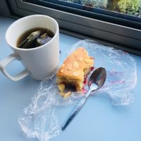 At home & loving the cake  at Greendays Cafe in Liverpool