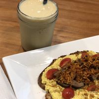 Tofu and sautéed mushroom on sourdough with Mango,banana and orange and soymilk at Soul ALife - Changi City Point in East Singapore