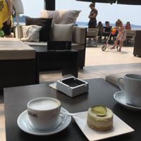 Soy cappuccino and lemon cake at Kavarna Cacao in Portoroz