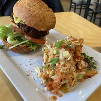 Cheeseburger (homemade patty) and spicy mango cole slaw   at Cafe Jardin in Verdun